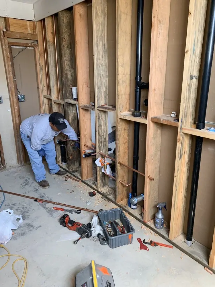 Commercial rough-in plumbing for Water Heater Replacement in Richmond